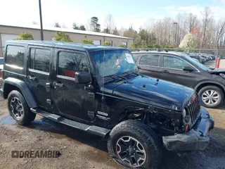 2013 Jeep Wrangler Unlimited Freedom z VIN 1C4BJWDG8DL648870, wystawiony jako IAAI lot #41909372 z przebiegiem 184 203 mil mil oraz . Historia ofert i sprzedaży dostępna na DreamBid. Obrazek 1.