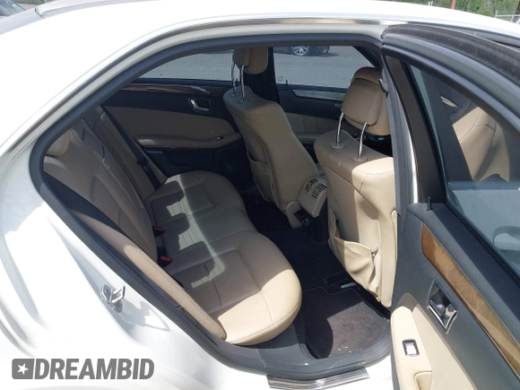 2010 Mercedes-Benz E-Class E 350 Luxury with VIN WDDHF5GB0AA059847, listed as a IAAI auction lot 42158332 with 293,386 mi miles. Bid and sale history available at carsss.com. Image 8.