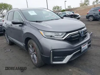 2020 Honda CR-V Touring z VIN 7FART6H99LE000979, wystawiony jako IAAI lot #42123744 z przebiegiem 74 779 mil mil oraz . Historia ofert i sprzedaży dostępna na DreamBid. Obrazek 1.