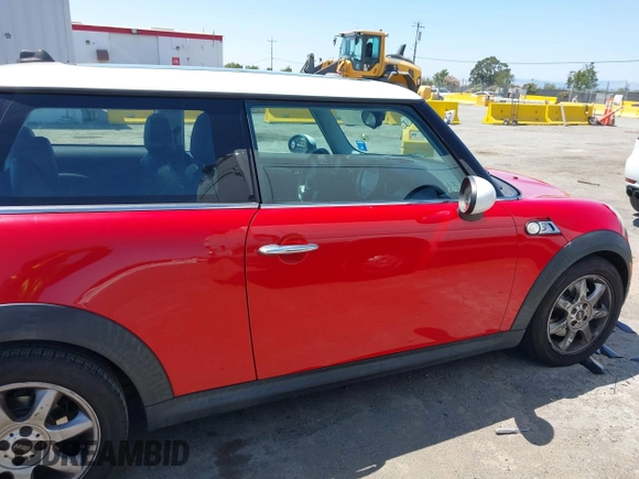 2009 MINI Hardtop S with VIN WMWMF73529TW84638, listed as a IAAI auction lot 42565544 with 60,721 mi miles and . Bid and sale history available at DreamBid. Image 14.