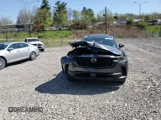 2024 Mazda CX-50 S Premium с VIN 7MMVABDMXRN173083, выставлен на аукционе Copart как лот 54336165 с пробегом 11 410 миль миль и Списание • Salvage title. История ставок и продаж доступна на DreamBid. Изображение 14.