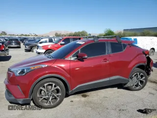 2019 Toyota C-HR XLE z VIN JTNKHMBX2K1049311, wystawiony jako Copart lot #57847185 z przebiegiem 74 489 mil mil oraz Szkoda całkowita • Salvage title. Historia ofert i sprzedaży dostępna na DreamBid. Obrazek 1.