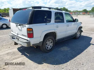 2005 Chevrolet Tahoe Z71 z VIN 1GNEK13TX5R202172, wystawiony jako IAAI lot #42330565 z przebiegiem 259 191 mil mil oraz . Historia ofert i sprzedaży dostępna na DreamBid. Obrazek 4.