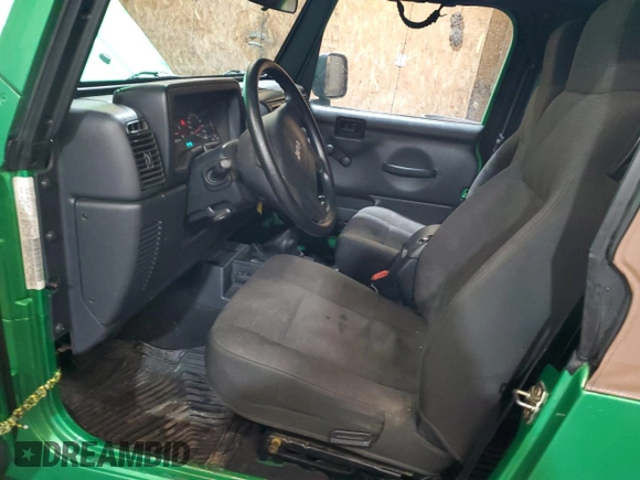2005 Jeep Wrangler X с VIN 1J4FA39S35P305742, выставлен на аукционе Copart как лот 57124995 с пробегом 159 419 миль миль и Списание • Salvage title. История ставок и продаж доступна на DreamBid. Изображение 7.