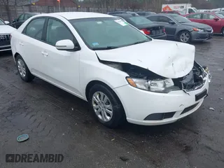2012 Kia Forte EX with VIN KNAFU4A25C5470311, listed as a IAAI auction lot 41964569 with 146,551 mi miles. Bid and sale history available at carsss.com. Image 1.
