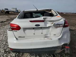 2015 Ford Focus SE with VIN 1FADP3F22FL235018, listed as a Copart auction lot 49861065 with Not Provided miles and Salvage Title. Bid and sale history available at DreamBid. Image 6.