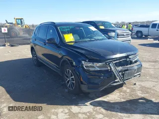 2020 Volkswagen Tiguan SE with VIN 3VV3B7AX0LM106561, listed as a IAAI auction lot 41712689 with 85,374 mi miles and . Bid and sale history available at DreamBid. Image 1.
