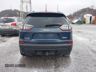 2021 Jeep Cherokee Latitude Lux z VIN 1C4PJMMX7MD201810, wystawiony jako IAAI lot #41235714 z przebiegiem 52 327 mil mil oraz . Historia ofert i sprzedaży dostępna na DreamBid. Obrazek 17.