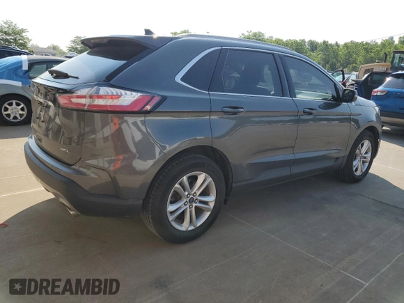 2020 Ford Edge SEL с VIN 2FMPK3J97LBB58552, выставлен на аукционе Copart как лот 58472995 с пробегом 71 387 миль миль и Списание • Salvage title. История ставок и продаж доступна на DreamBid. Изображение 3.