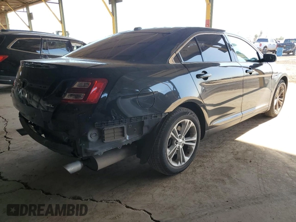 2015 Ford Taurus SEL with VIN 1FAHP2E82FG132241, listed as a Copart auction lot 53970065 with 114,947 mi miles and Salvage Title. Bid and sale history available at carsss.com. Image 3.