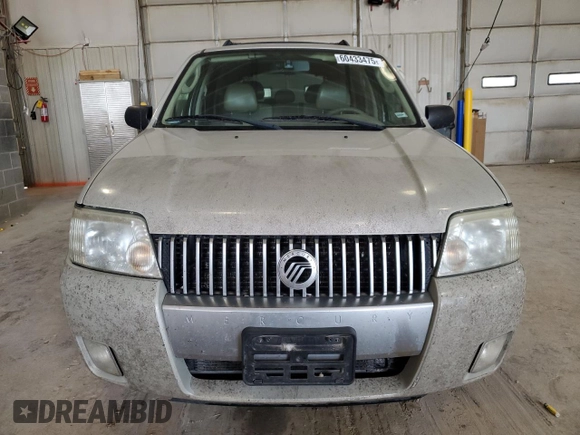 2007 Mercury Mariner Premier with VIN 4M2CU97107KJ05778, listed as a Copart auction lot 60433475 with 218,344 mi miles and Salvage title. Bid and sale history available at DreamBid. Image 5.