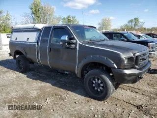 1999 Ford F-250 XL with VIN 1FTNX21L5XEA67499, listed as a Copart auction lot 50822095 with 480,067 mi miles and Salvage title. Bid and sale history available at DreamBid. Image 4.