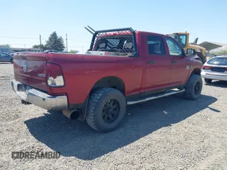 2011 Ram 2500 Big Horn z VIN 3D7UT2CL2BG523583, wystawiony jako IAAI lot #42407680 z przebiegiem 164 168 mil mil oraz . Historia ofert i sprzedaży dostępna na DreamBid. Obrazek 4.
