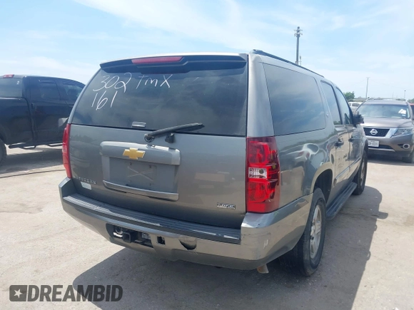 2007 Chevrolet Suburban LTZ with VIN 3GNFC16047G302161, listed as a IAAI auction lot 42053997 with 173,922 mi miles. Bid and sale history available at carsss.com. Image 4.