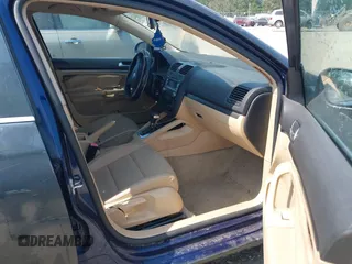 2007 Volkswagen Jetta 2.5 z VIN 3VWRF71K67M131095, wystawiony jako IAAI lot #42561971 z przebiegiem 127 592 mil mil oraz . Historia ofert i sprzedaży dostępna na DreamBid. Obrazek 5.