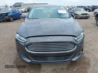 2016 Ford Fusion SE Hybrid with VIN 3FA6P0LU5GR235241, listed as a IAAI auction lot 41697504 with 165,510 mi miles. Bid and sale history available at carsss.com. Image 12.