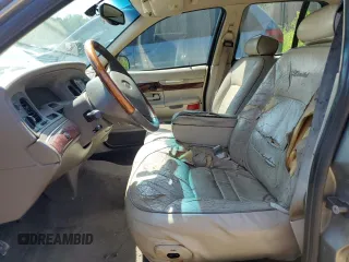 2000 Mercury Grand Marquis LS z VIN 2MEFM75W7YX694301, wystawiony jako Copart lot #57225295 z przebiegiem 141 420 mil mil oraz Szkoda całkowita • Salvage title. Historia ofert i sprzedaży dostępna na DreamBid. Obrazek 7.