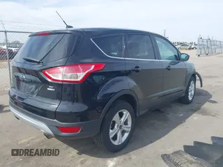 2014 Ford Escape SE with VIN 1FMCU9G91EUA07321, listed as a IAAI auction lot 41807424 with 149,276 mi miles and . Bid and sale history available at DreamBid. Image 4.