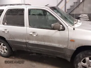 2003 Mazda Tribute DX with VIN 4F2YZ02B73KM43813, listed as a IAAI auction lot 41575708 with 202,214 mi miles and . Bid and sale history available at carsss.com. Image 13.