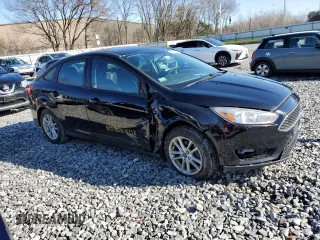 2018 Ford Focus SE with VIN 1FADP3FE9JL306394, listed as a Copart auction lot 52902175 with 77,338 mi miles and Salvage title. Bid and sale history available at DreamBid. Image 4.