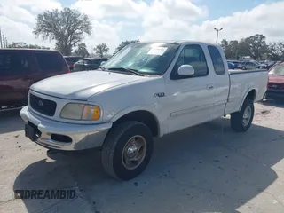 1997 Ford F-150 XL with VIN 1FTDX1868VKA12923, listed as a IAAI auction lot 41526986 with 343,755 mi miles. Bid and sale history available at carsss.com. Image 2.