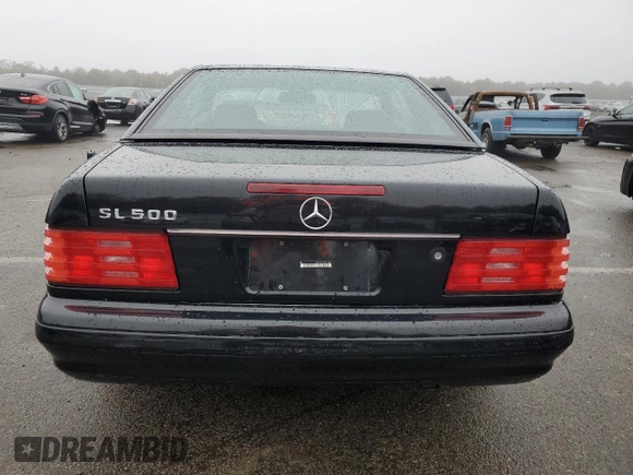 1998 Mercedes-Benz SL 500 with VIN WDBFA67F9WF159317, listed as a Copart auction lot 74148733 with 47,681 mi miles and Non repairable. Bid and sale history available at DreamBid. Image 6.