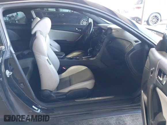 2014 Hyundai Genesis Coupe R-Spec z VIN KMHHT6KD0EU114041, wystawiony jako IAAI lot #41752761 z przebiegiem 107 377 mil mil oraz . Historia ofert i sprzedaży dostępna na DreamBid. Obrazek 5.