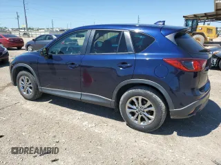 2014 Mazda CX-5 Touring with VIN JM3KE2CY7E0362879, listed as a Copart auction lot 53079545 with 70,863 mi miles and Salvage Title. Bid and sale history available at carsss.com. Image 2.
