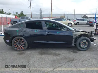 2019 Tesla Model 3 Mid Range with VIN 5YJ3E1EA3KF415601, listed as a IAAI auction lot 42125393 with 150,220 mi miles and . Bid and sale history available at carsss.com. Image 14.