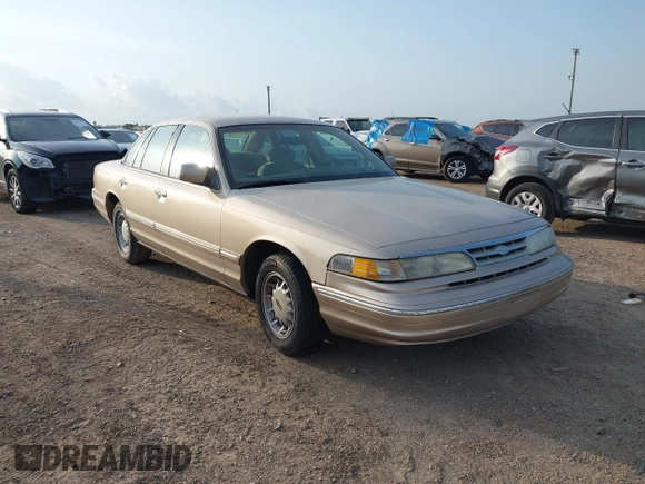 1997 Ford Crown Victoria LX z VIN 2FALP74W1VX194522, wystawiony jako IAAI lot #42378930 z przebiegiem 113 521 mil mil oraz . Historia ofert i sprzedaży dostępna na DreamBid. Obrazek 1.