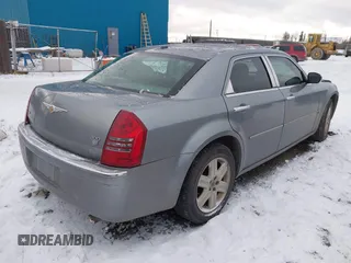 2006 Chrysler 300 C with VIN 2C3KK63H66H382504, listed as a IAAI auction lot 40599570 with 161,754 mi miles. Bid and sale history available at carsss.com. Image 4.