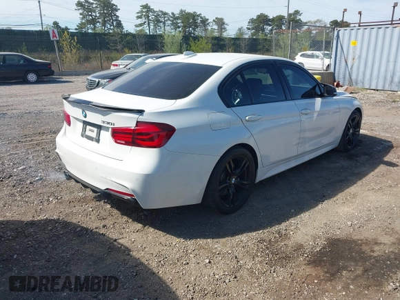 2017 BMW 3 Series 330i with VIN WBA8B9G32HNU52805, listed as a IAAI auction lot 42139448 with 136,333 mi miles. Bid and sale history available at carsss.com. Image 4.