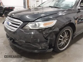 2011 Ford Taurus SEL with VIN 1FAHP2EW4BG160633, listed as a IAAI auction lot 41778406 with 125,934 mi miles. Bid and sale history available at carsss.com. Image 6.