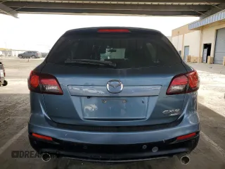 2015 Mazda CX-9 Touring z VIN JM3TB3CV2F0467257, wystawiony jako Copart lot #55896725 z przebiegiem 146 877 mil mil oraz Czysty tytuł • Clean title. Historia ofert i sprzedaży dostępna na DreamBid. Obrazek 6.