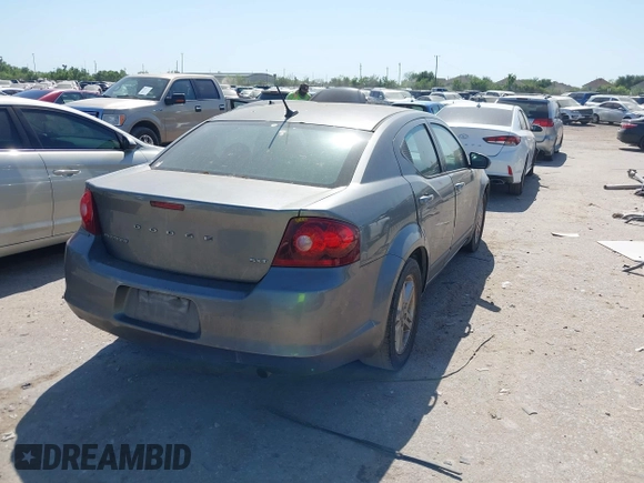 2013 Dodge Avenger SXT with VIN 1C3CDZCB8DN562180, listed as a IAAI auction lot 42000811 with 207,872 mi miles and . Bid and sale history available at carsss.com. Image 4.