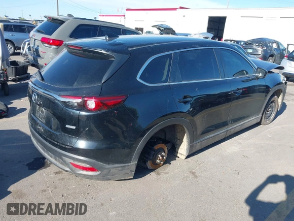 2018 Mazda CX-9 Sport with VIN JM3TCBBY6J0222750, listed as a IAAI auction lot 42294464 with 63,927 mi miles and . Bid and sale history available at DreamBid. Image 4.