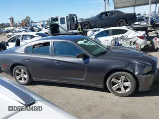 2013 Dodge Charger SE with VIN 2C3CDXBGXDH688230, listed as a IAAI auction lot 41634325 with 133,519 mi miles. Bid and sale history available at carsss.com. Image 13.