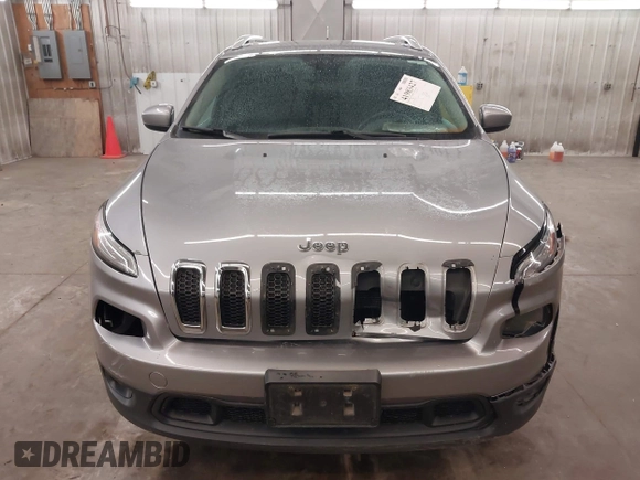 2014 Jeep Cherokee Altitude with VIN 1C4PJMCB9EW149754, listed as a IAAI auction lot 41983427 with 199,810 mi miles and . Bid and sale history available at DreamBid. Image 13.