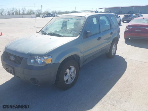 2007 Ford Escape XLS with VIN 1FMYU92Z77KB08603, listed as a IAAI auction lot 41858410 with 144,830 mi miles. Bid and sale history available at carsss.com. Image 2.
