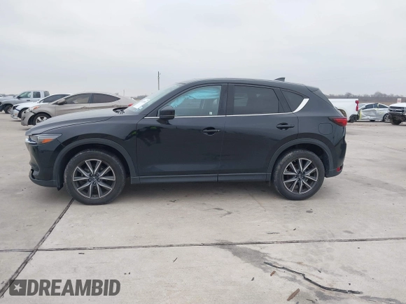 2017 Mazda CX-5 Grand Touring with VIN JM3KFADL9H0110985, listed as a IAAI auction lot 41435143 with 88,208 mi miles. Bid and sale history available at carsss.com. Image 14.