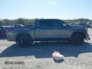 2022 Toyota Tundra 1794 Edition with VIN 5TFMA5DB9NX015571, listed as a IAAI auction lot 41730283 with 76,429 mi miles and . Bid and sale history available at DreamBid. Image 13.