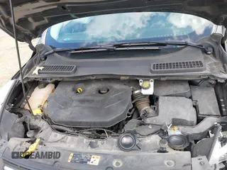 2016 Ford Escape SE z VIN 1FMCU9G92GUC37694, wystawiony jako IAAI lot #41917697 z przebiegiem 78 511 mil mil oraz . Historia ofert i sprzedaży dostępna na DreamBid. Obrazek 10.