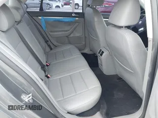2009 Volkswagen Jetta SE z VIN 3VWRM71K99M167159, wystawiony jako IAAI lot #42409998 z przebiegiem 78 459 mil mil oraz . Historia ofert i sprzedaży dostępna na DreamBid. Obrazek 8.