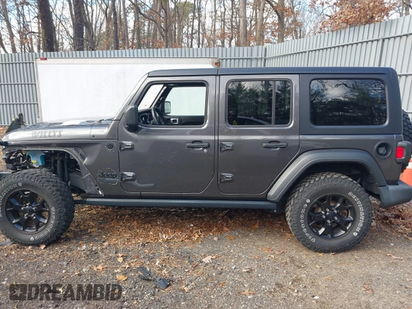 2021 Jeep Wrangler Unlimited Sport S with VIN 1C4HJXDN4MW518307, listed as a IAAI auction lot 41222996 with 39,499 mi miles and . Bid and sale history available at DreamBid. Image 14.