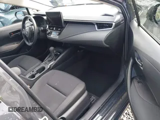 2023 Toyota Corolla Hybrid LE with VIN JTDBCMFE8P3022489, listed as a IAAI auction lot 41766861 with 44,571 mi miles. Bid and sale history available at carsss.com. Image 5.