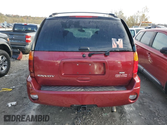 2006 GMC Envoy SLT with VIN 1GKDS13S762259102, listed as a Copart auction lot 79233224 with 125,404 mi miles and Salvage Title. Bid and sale history available at carsss.com. Image 6.