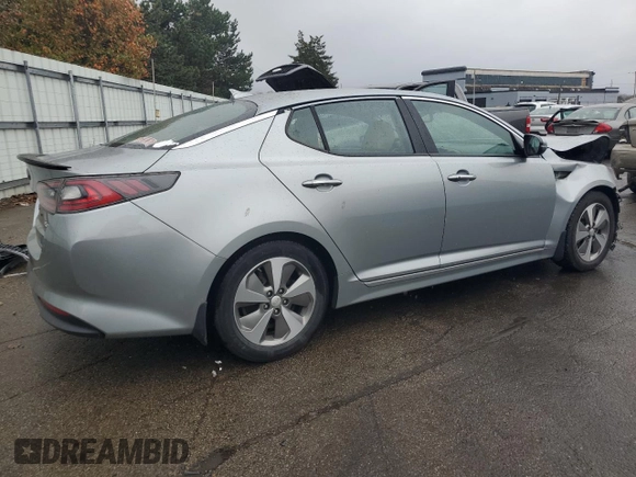 2014 Kia Optima Hybrid EX with VIN KNAGN4AD2E5069076, listed as a Copart auction lot 79523534 with 93,504 mi miles and Salvage Title. Bid and sale history available at carsss.com. Image 3.