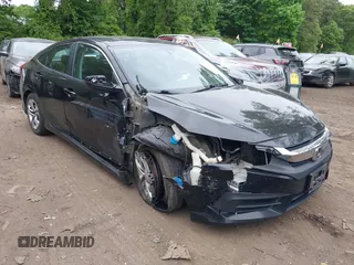 2017 Honda Civic LX z VIN 2HGFC2F58HH546893, wystawiony jako IAAI lot #42368989 z przebiegiem 148 938 mil mil oraz . Historia ofert i sprzedaży dostępna na DreamBid. Obrazek 1.