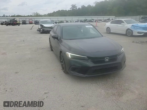 2023 Honda Civic Sport z VIN 2HGFE2F57PH520634, wystawiony jako Copart lot #51852665 z przebiegiem 52 641 mil mil oraz Szkoda całkowita • Salvage title. Historia ofert i sprzedaży dostępna na DreamBid. Obrazek 10.
