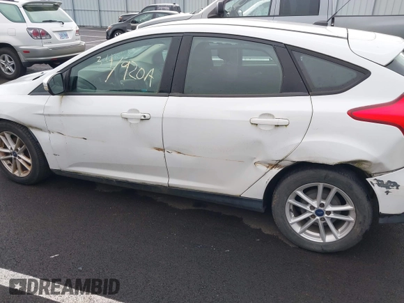 2017 Ford Focus SE with VIN 1FADP3K21HL206893, listed as a IAAI auction lot 41871402 with 243,940 mi miles and . Bid and sale history available at carsss.com. Image 6.